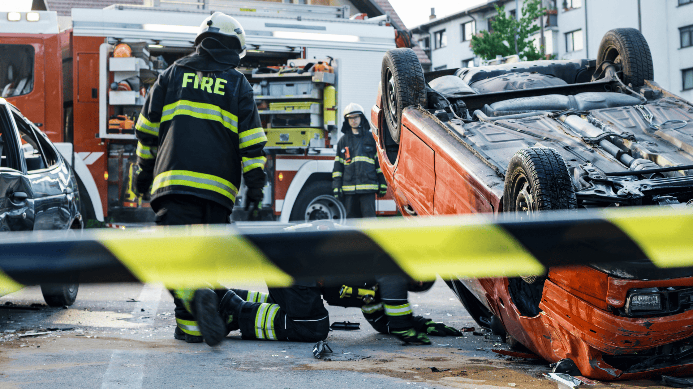 Fire department working on a car accident showcasing: Understanding Car Accident Compensation in 2024.